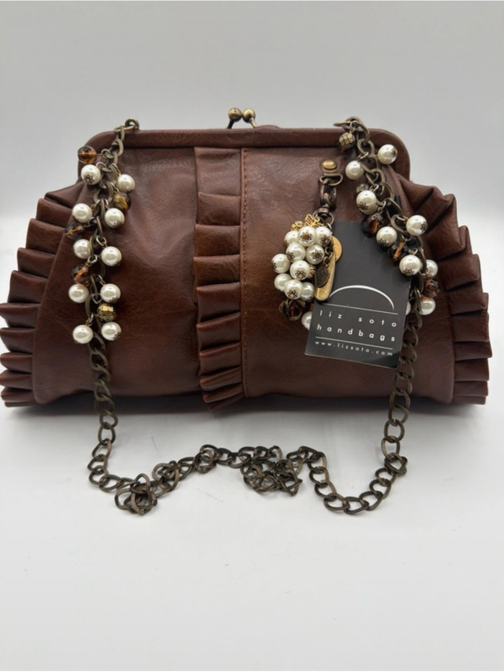 Liz Soto Brown Ruffle Frame Clutch with Pearl-Accented Chain